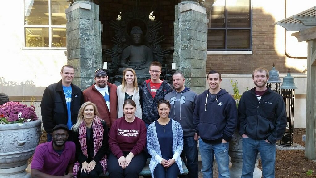 Group of students doing some sight-seeing while traveling to take the NBCE part 4 exam