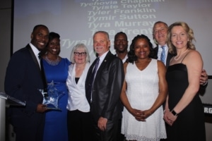 Dr. Land receiving award