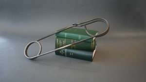 Still life of Green Books and Pin for web page