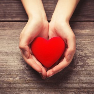 Image of hands holding heart