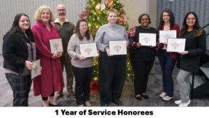 Sherman College staff and faculty celebrating at the annual service awards ceremony