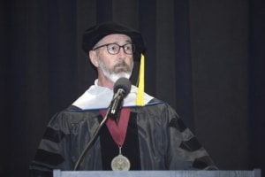Sherman College June 14, 2025 speaker Bobby Findley, D.C., A.C.P., speaking to graduates of the June 2025 and September 2025 graduating classes.