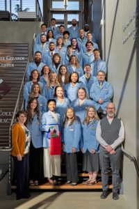 Winter 2026 Pinning Interns on Staircase