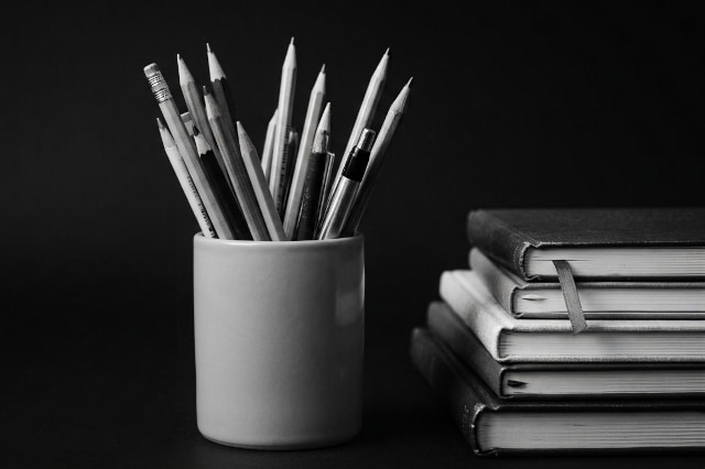 Stock Image of Pencils and notebooks
