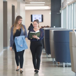 students walking down hallway