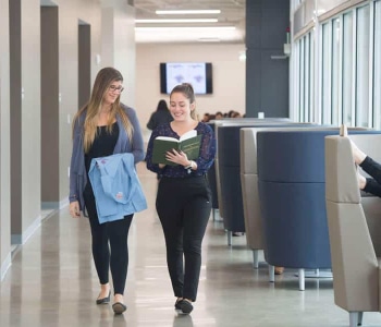 students walking down hallway